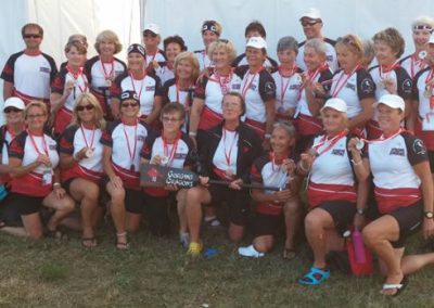 River Spirit team group photo in white team shirts