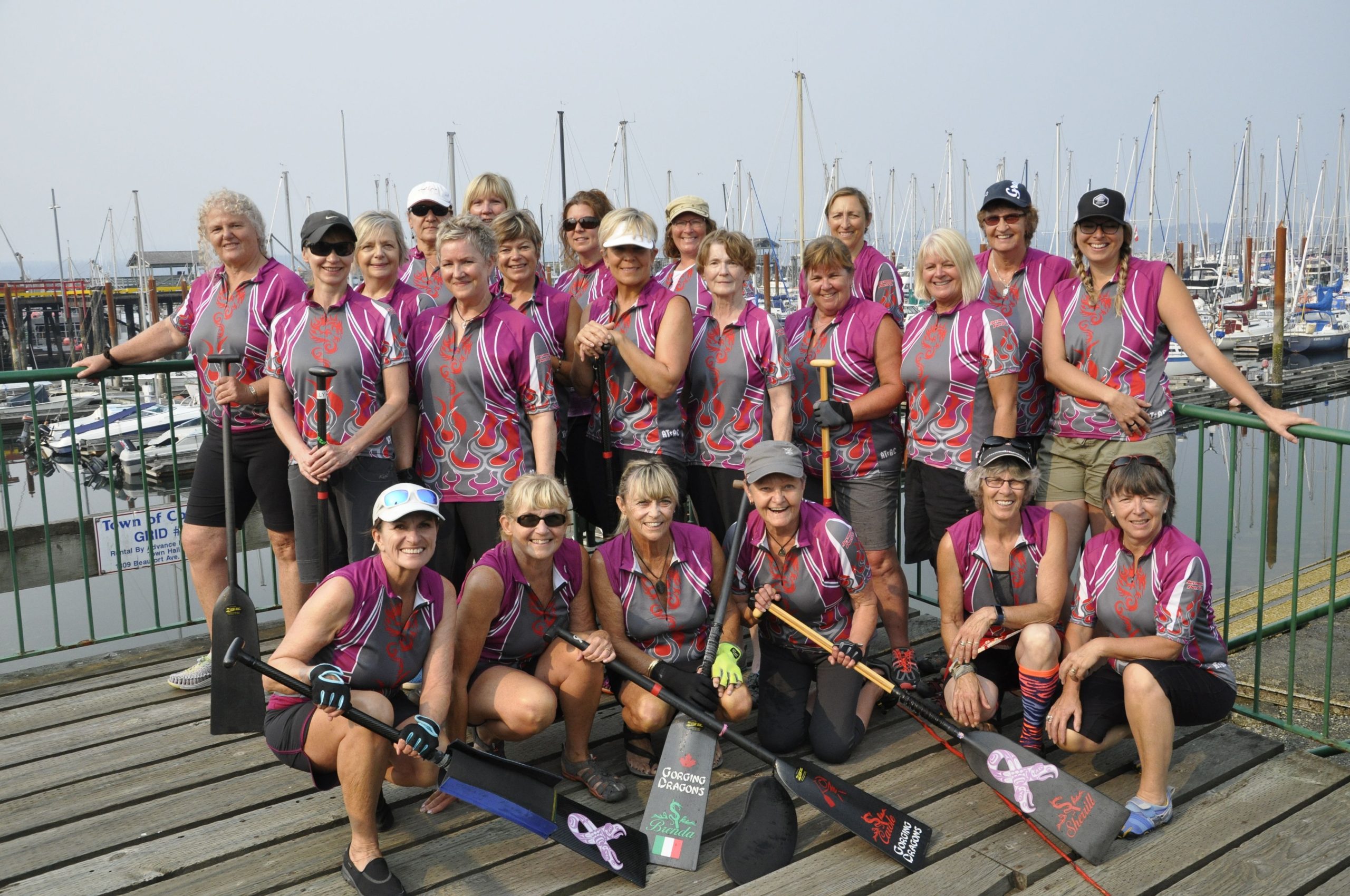 River Spirit at the 2017 Comox regatta River Spirit paddlers in team jerseys on the dock at the 2017 Comox regatta