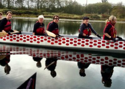 River Spirit crew out on the water in their dragon boat